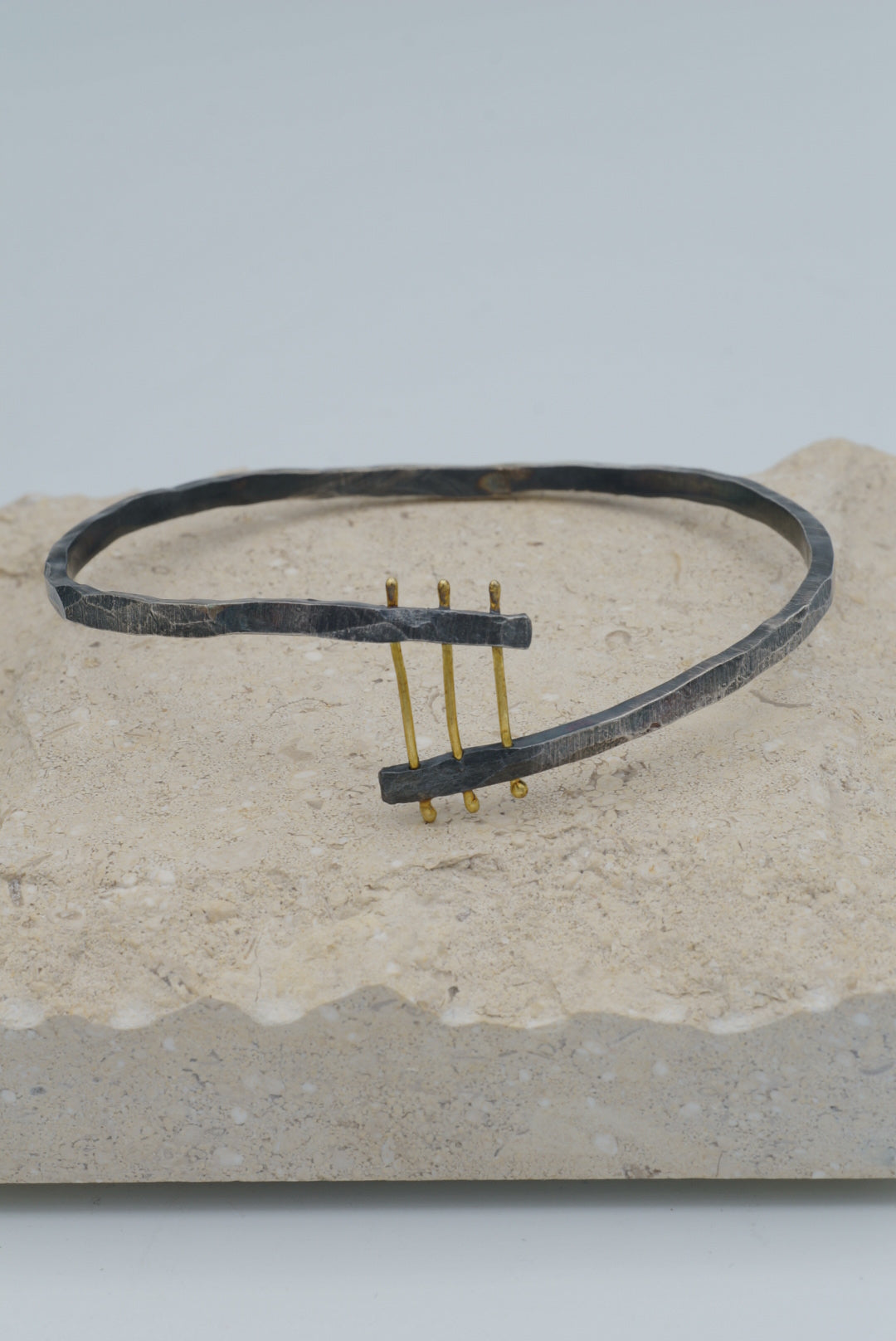 Three Gold Connections Oxidized Silver Bangle