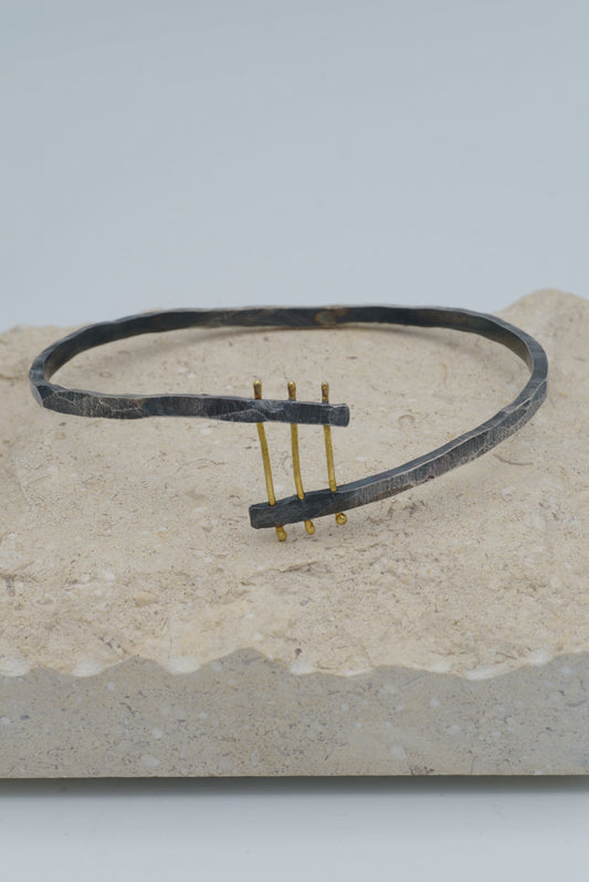 Three Gold Connections Oxidized Silver Bangle