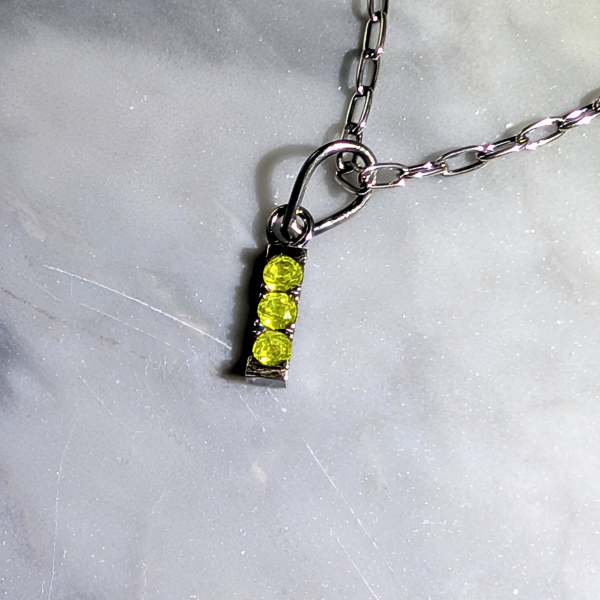 3 Stone Yellow YAG Pendant with a Silver Chain