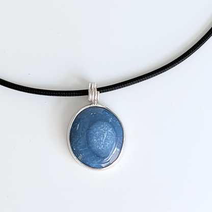 Oval Blue Opal Pendant on black Cord