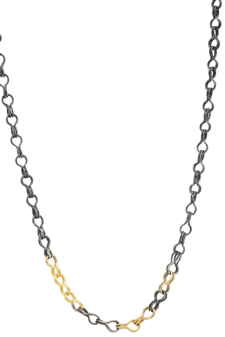 A fine silver necklace with oxidized blackening and gold accents, featuring a linked chain design.